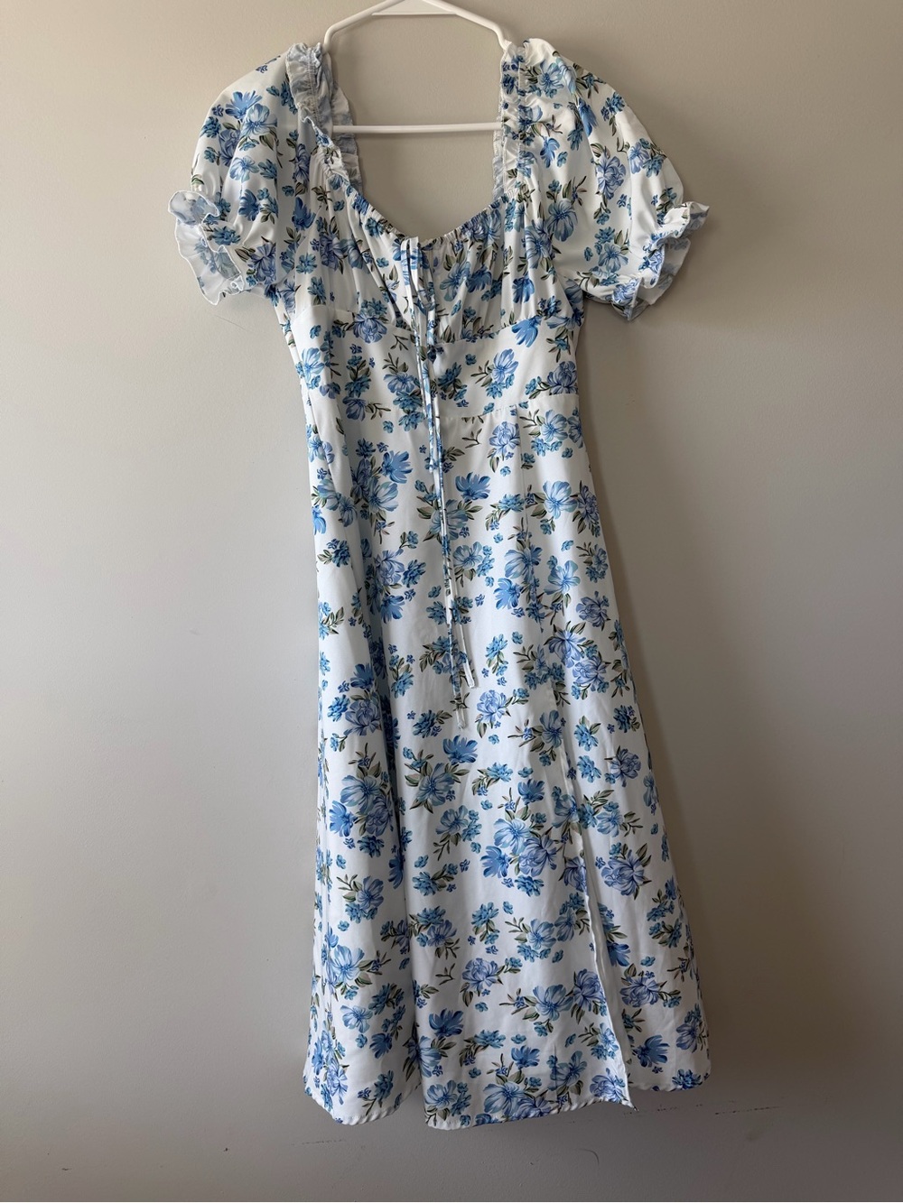 White Midi Dress with Blue Floral Print and Puff Sleeves. Slit In Front